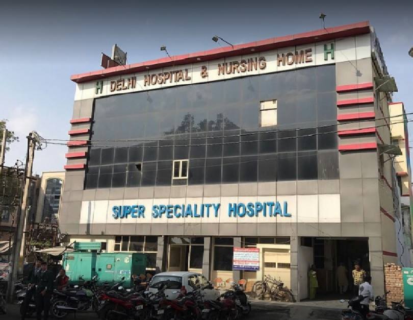 Delhi Hospital and Nursing Home Logo