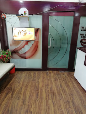 Dr Bajaj dental clinic Logo