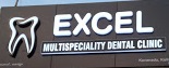 Excel Multispeciality Dentist - Logo