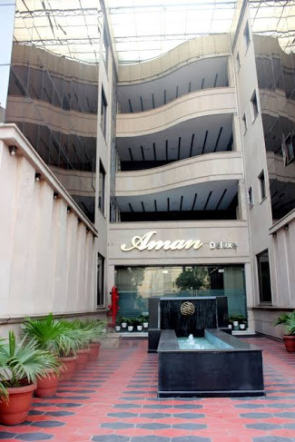 Hotel Aman Deluxe Logo