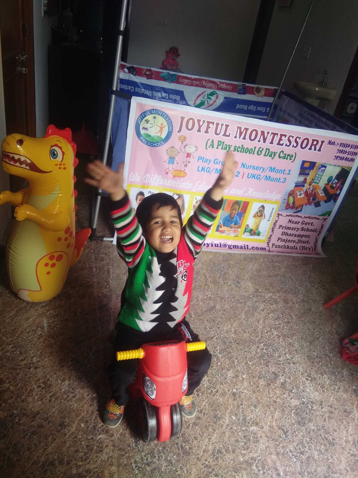 Joyful Montessori Play School Logo