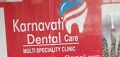 Karnavati Dental Care Logo