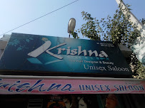 Krishna Unisex Saloon Logo