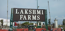 Lakshmi Farms Logo