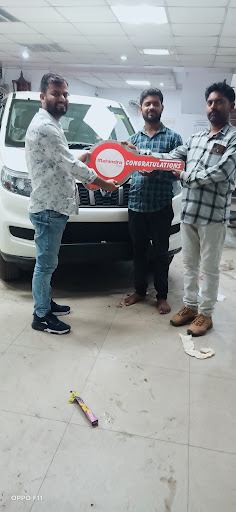 Mahindra & Mahindra Automotive | Show Room