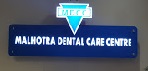 Malhotra Dental Care Centre Logo