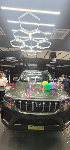 NEON MOTORS PVT LTD - mahindra Automotive | Show Room