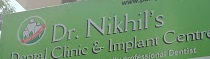 Nikhil Dental Clinic And Implant Centre Logo