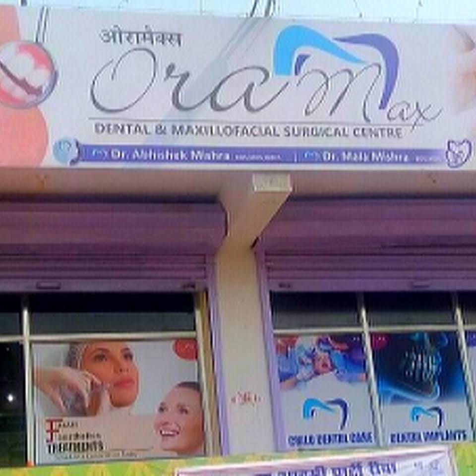 Oramax Dental Clinic Logo