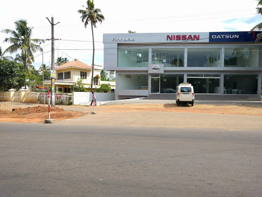 PINNACLE NISSAN KOLLAM Automotive | Show Room