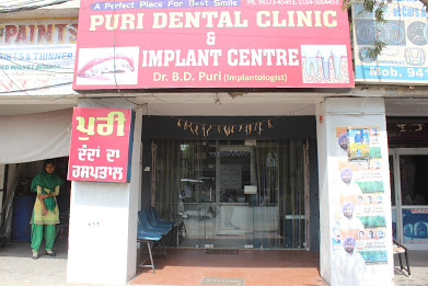 Puri Dental Clinic Logo