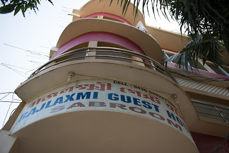 RajLaxmi Guest House - Logo