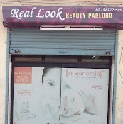 Real Look Beauty Parlour - Logo