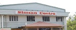 Simon Centre Kalyanamandapam Logo