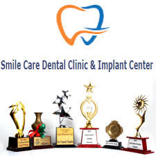 Smile Care Dental Clinic And Implant Center Logo