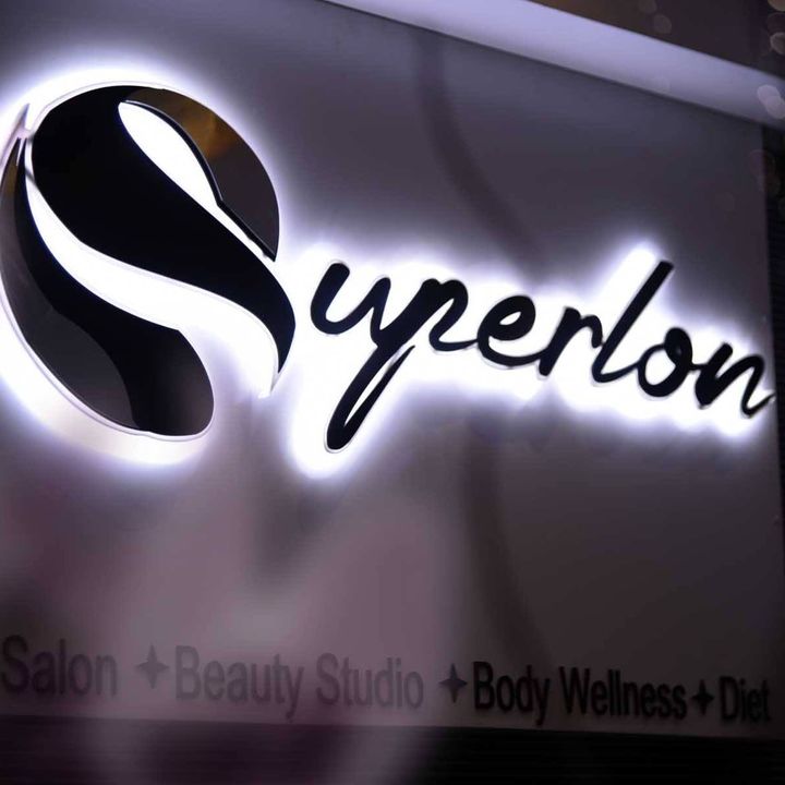 SUPERLON FAMILY SALON AND SPA Logo