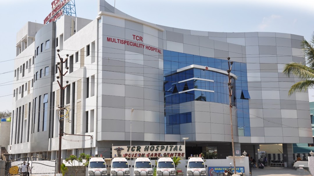 TCR MULTISPECIALITY HOSPITAL - Logo