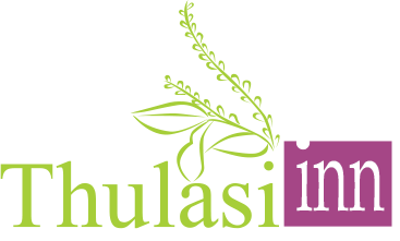 THULASI INN Logo