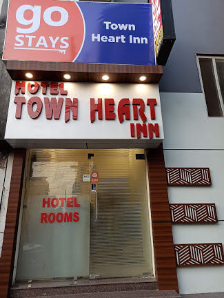 Town Heart Inn - Logo