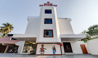 Treebo Trend Highness Inn - Hotel in Airport Road, Eanchakkal Logo