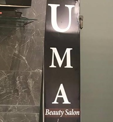 Uma beauty salon - Logo