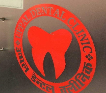 Varsha Dentist Logo
