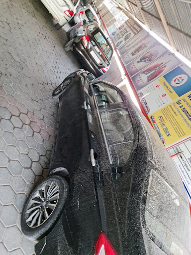 Varun Motors - Maruti Suzuki Car Dealer) Automotive | Show Room