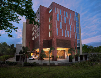 WELCOMHOTEL COIMBATORE Logo